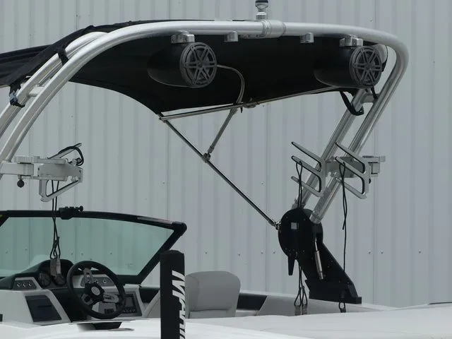Slide: The Image of 2020 MasterCraft NXT22 boat with speakers and steering console. - 17