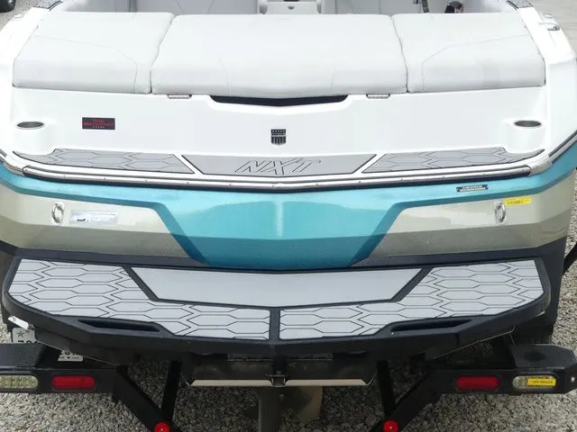 Slide: The Image of Rear view of a 2020 MasterCraft NXT22 boat on a trailer. - 22