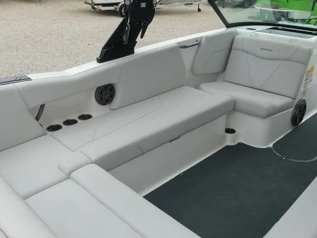Slide: The Image of Interior of a 2020 MasterCraft NXT22 boat with white seating. - 25