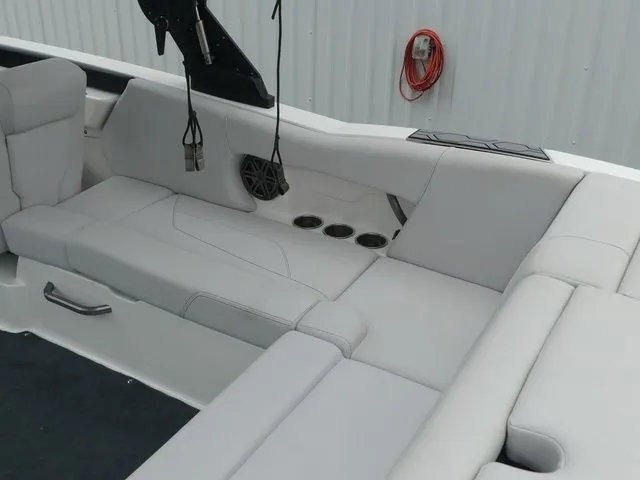 Slide: The Image of Interior of a 2020 MasterCraft NXT22 boat with gray upholstery. - 27