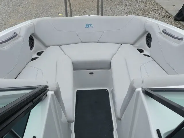 Slide: The Image of Interior of a 2020 MasterCraft NXT22 boat with gray upholstery. - 28