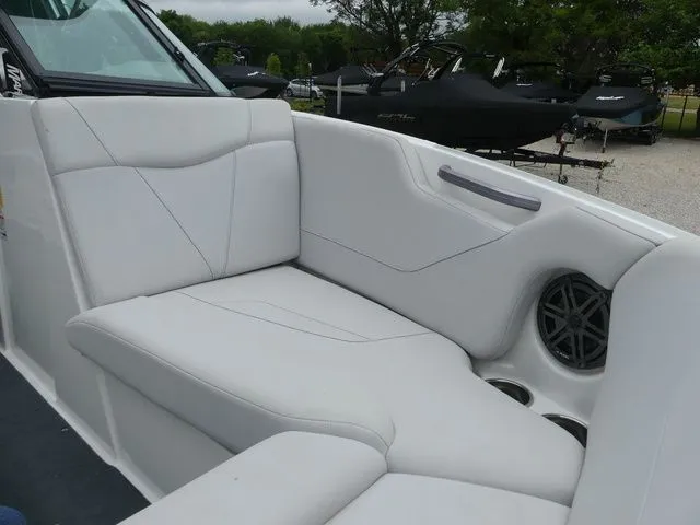 Slide: The Image of Interior of a 2020 MasterCraft NXT22 boat with white upholstery. - 30