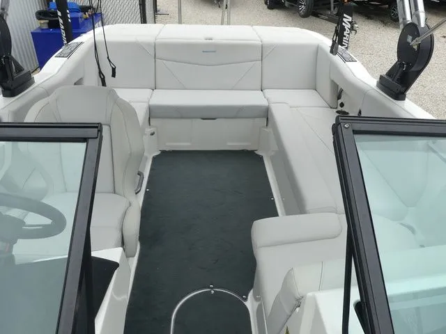 Slide: The Image of Interior of a 2020 MasterCraft NXT22 boat with white seating. - 31
