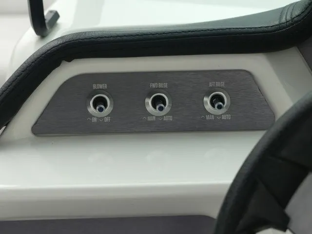 Slide: The Image of Control panel of a 2020 MasterCraft NXT22 boat with switches. - 37