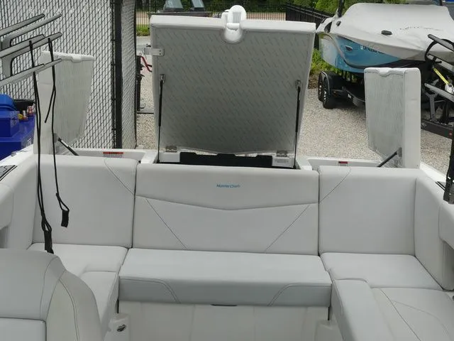 Slide: The Image of Interior of a 2020 MasterCraft NXT22 boat with white seating. - 39