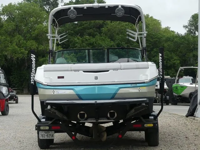 Slide: The Image of Rear view of a 2020 MasterCraft NXT22 boat on a trailer. - 6