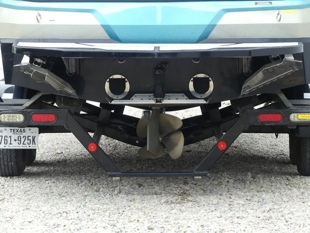 Slide: The Image of Rear view of a 2020 MasterCraft NXT22 boat on a trailer. - 7
