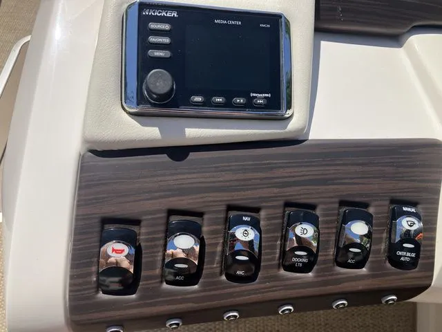 Slide: The Image of Dashboard of a 2019 Bennington 23 QLC boat. - 17