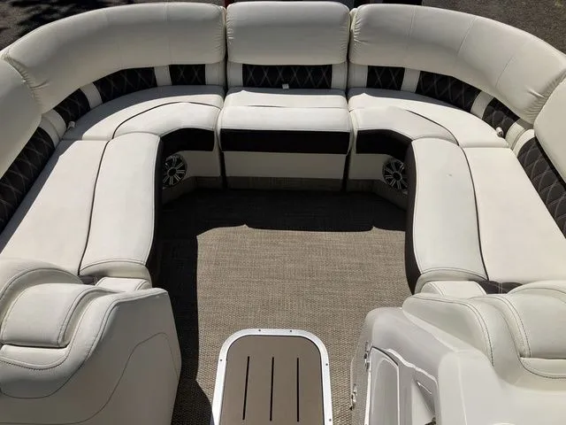 Slide: The Image of Interior of a 2019 Bennington 23 QLC pontoon boat with luxurious seating. - 20