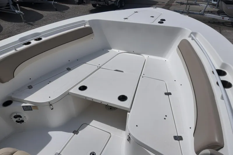 Slide: The Image of 2026 NAUTIC STAR 28 XS boat interior with seating and storage compartments. - 10