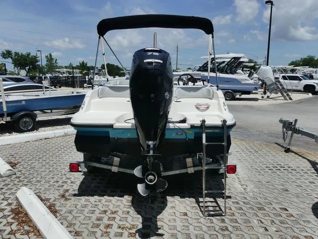 Slide: The Image of Rear view of a 2022 Bayliner Element M17 boat outdoors. - 3