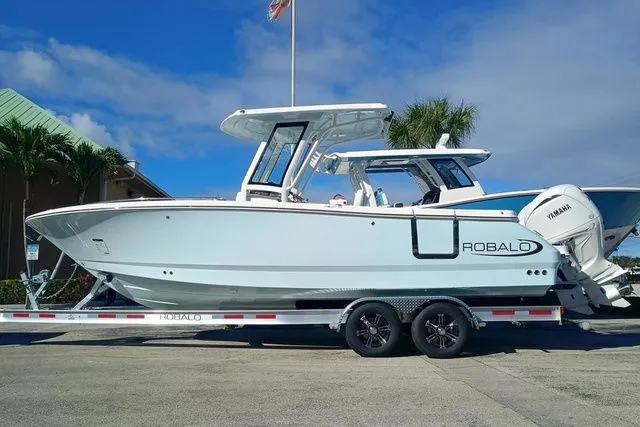 The Image of 2026 Robalo R300 Center Console on trailer, side view. - 1