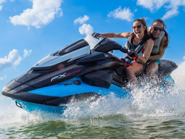 Slide: The Image of Two people riding 2025 Yamaha WaveRunner FX SVHO on water. - 19