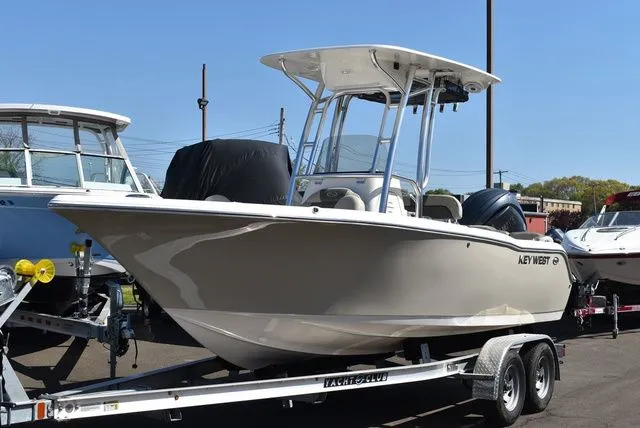 Slide: The Image of 2026 Key West 203 FS boat on trailer outdoors. - 3