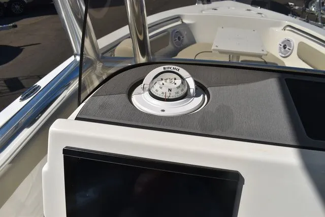 Slide: The Image of Compass on Key West 203 FS boat, year 2026. - 38