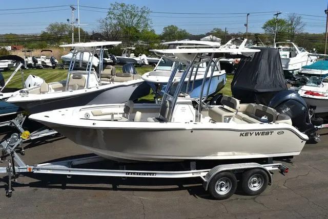 Slide: The Image of 2026 Key West 203 FS boat displayed outdoors on a trailer. - 4