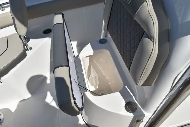 Slide: The Image of Key West 203 FS 2026 boat seat with storage compartment. - 43
