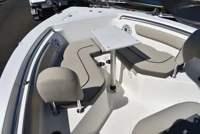 Slide: The Image of Interior of Key West 203 FS boat, 2026 model, featuring seating area and table. - 44