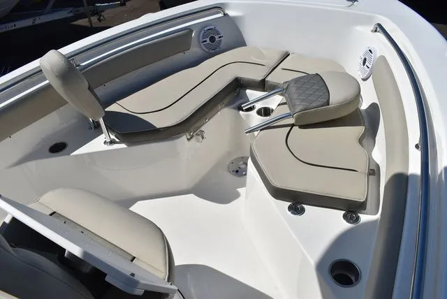 Slide: The Image of Interior of Key West 203 FS boat, 2026 model, featuring beige seating. - 46