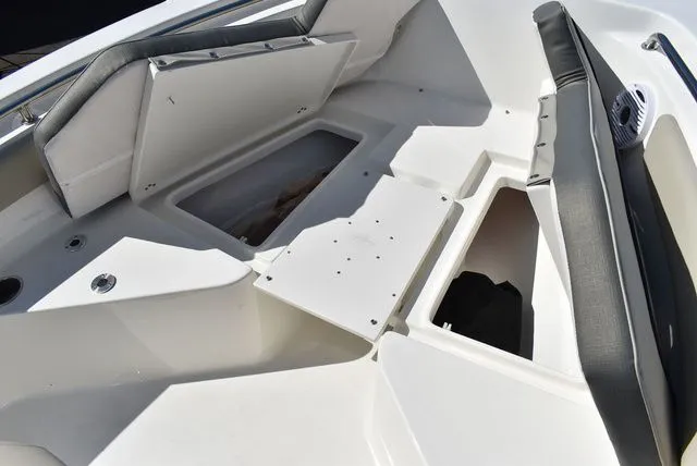 Slide: The Image of Interior of Key West 203 FS boat, 2026 model, featuring storage compartments. - 48