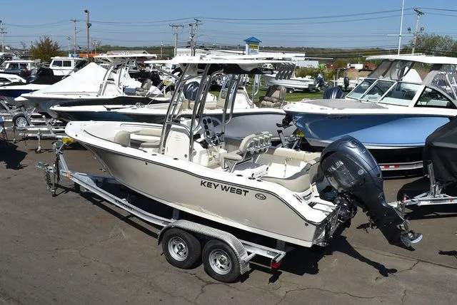 Slide: The Image of 2026 Key West 203 FS boat on trailer outdoors. - 5