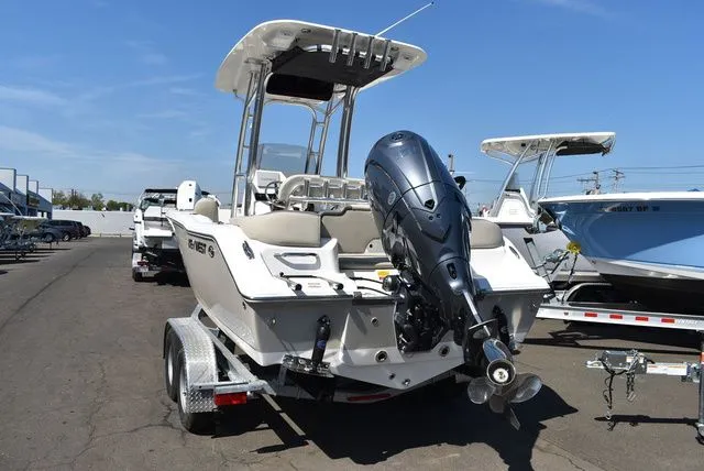 Slide: The Image of 2026 Key West 203 FS boat on trailer, outboard motor visible. - 7