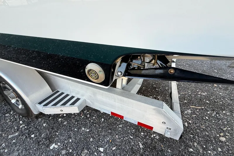 Slide: The Image of 2024 Nor-Tech 400 Supersport boat on trailer, showcasing hull and trailer details. - 19