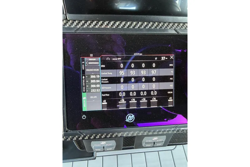 Slide: The Image of Dashboard display of a 2024 Nor-Tech 400 Supersport boat showing engine metrics. - 24