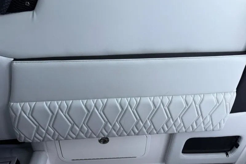 Slide: The Image of 2024 Nor-Tech 400 Supersport interior detail with diamond-stitched upholstery. - 26