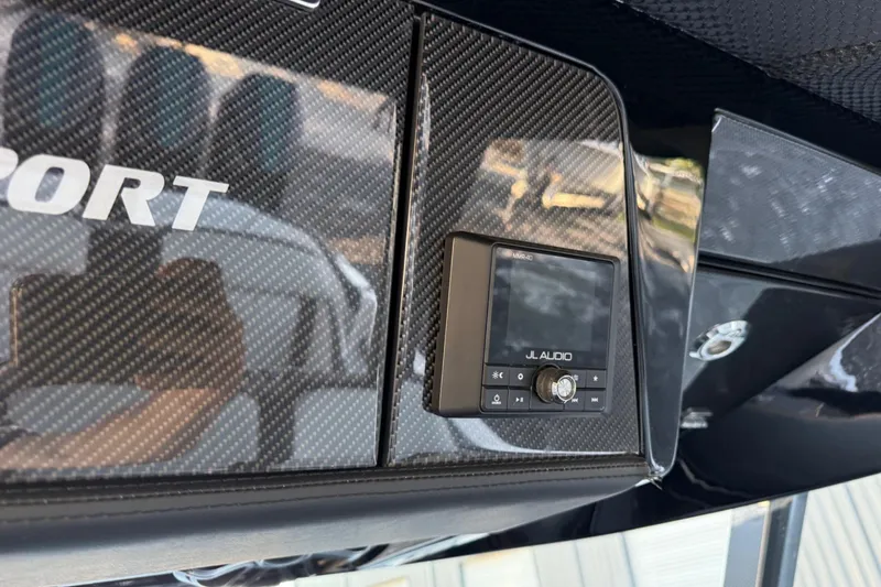 Slide: The Image of Carbon fiber dashboard of 2024 Nor-Tech 400 Supersport with JL Audio system. - 36