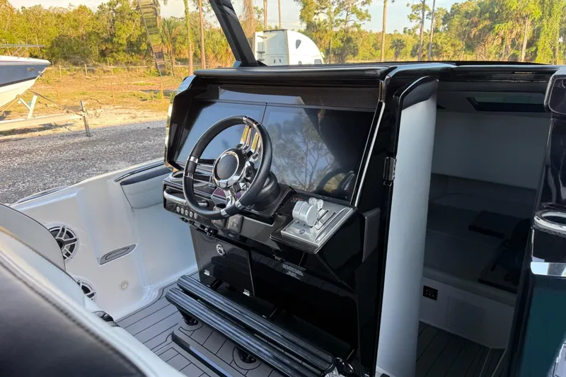 Slide: The Image of 2024 Nor-Tech 400 Supersport helm with sleek steering wheel and modern controls. - 38