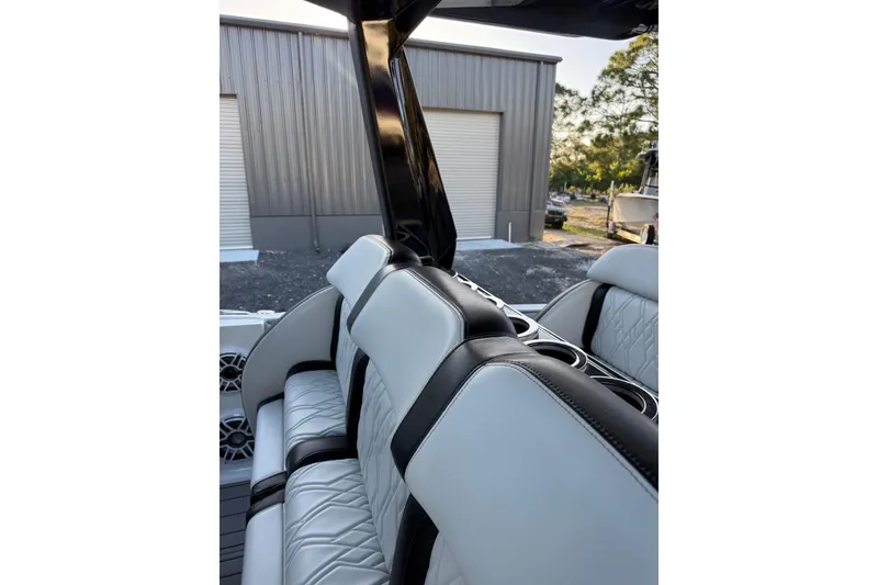 Slide: The Image of 2024 Nor-Tech 400 Supersport boat interior with luxurious seating and modern design. - 41