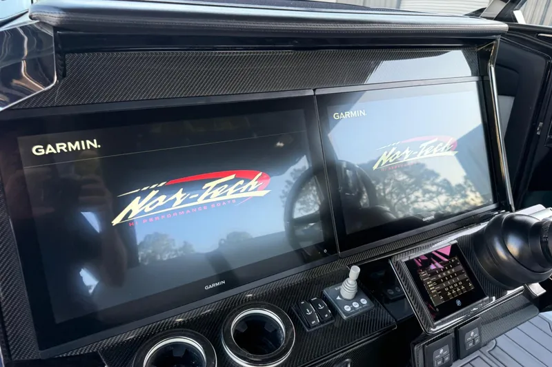 Slide: The Image of Dashboard of 2024 Nor-Tech 400 Supersport with dual Garmin displays. - 53