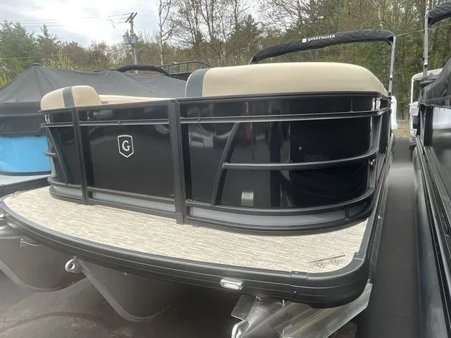 Slide: The Image of 2026 Godfrey Sweetwater 2086 C Sport Tube pontoon, black, on trailer. - 3