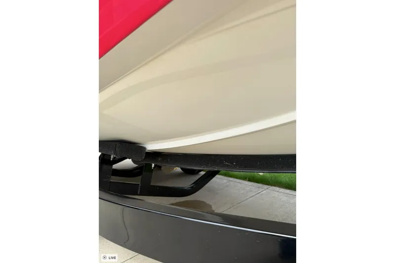Slide: The Image of 2020 Axis A20 boat hull on trailer, close-up view. - 13