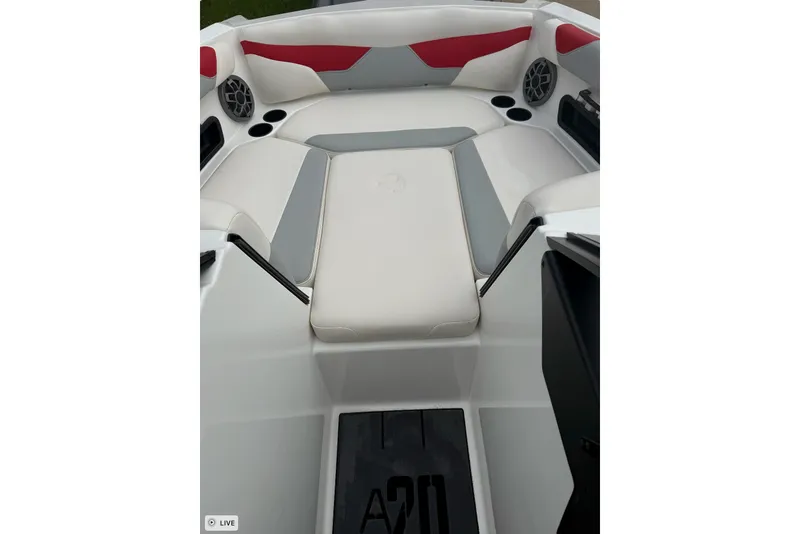 Slide: The Image of Interior of a 2020 Axis A20 boat with red and gray seating. - 5