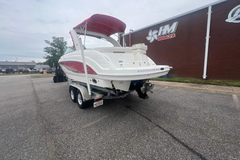Slide: The Image of 2006 Chaparral 256 SSi boat on trailer outside HM Boats building. - 5