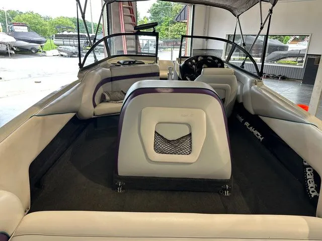 Slide: The Image of Interior of a 1995 Tigé 2002 FSLM Comp boat, gray upholstery. - 5