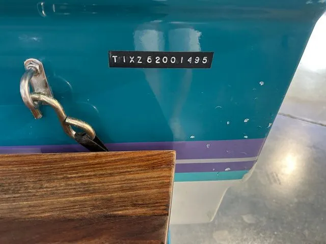 Slide: The Image of Close-up of a 1995 Tigé 2002 FSLM Comp boat hull. - 9