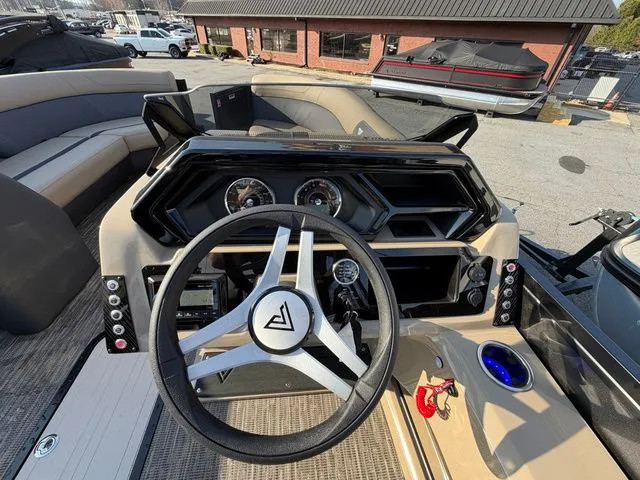 Slide: The Image of Interior view of Viaggio x22u 2026 boat cockpit with modern steering wheel. - 11
