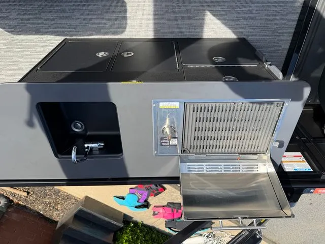 Slide: The Image of Viaggio Lago Z22B 2026 outdoor kitchen with sink and grill. - 10