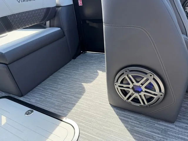 Slide: The Image of Interior of 2026 Viaggio Lago Z22B with speaker and gray upholstery. - 8