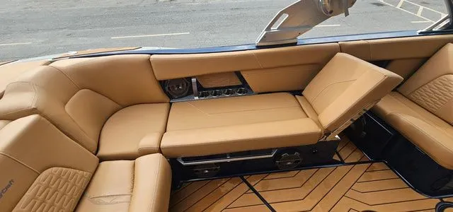 Slide: The Image of Interior of a 2020 MasterCraft X24 with luxurious leather seating. - 12