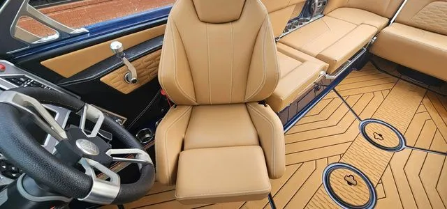 Slide: The Image of Interior of a 2020 MasterCraft X24 with luxurious leather seating. - 16