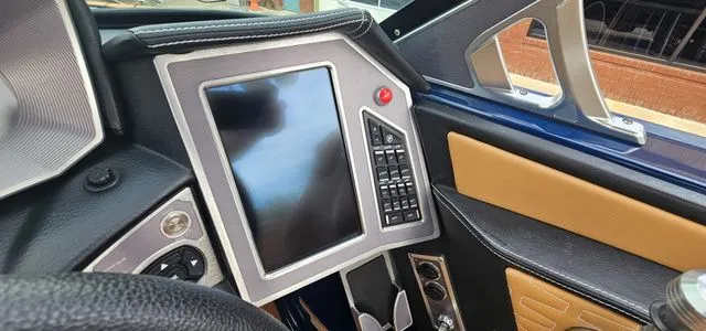 Slide: The Image of Dashboard of a 2020 MasterCraft X24 boat with touchscreen. - 17