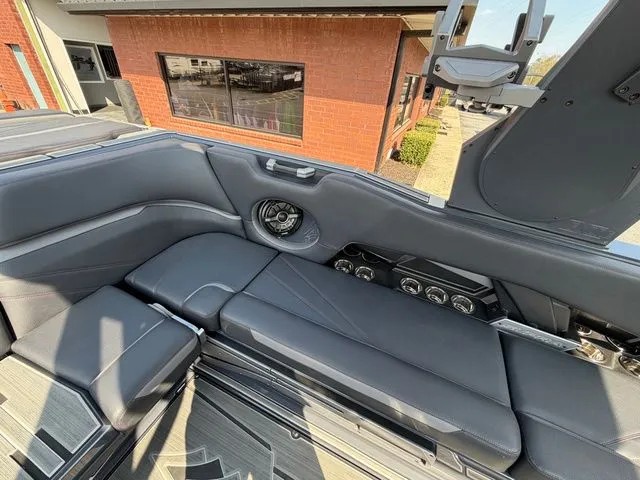 Slide: The Image of 2023 Supra SL550 interior with luxurious black leather seating. - 13