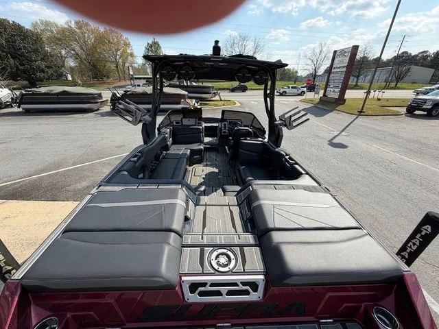 Slide: The Image of Interior of a 2023 Supra SL550 boat with luxurious seating. - 18