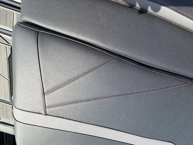 Slide: The Image of Close-up of the leather seat in a 2023 Supra SL550. - 27