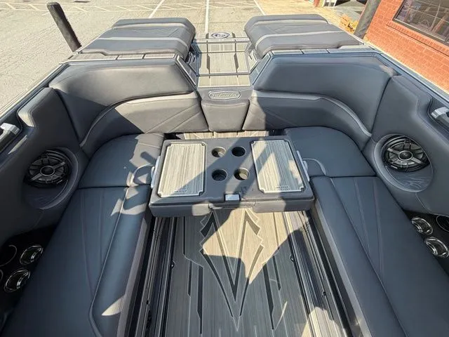 Slide: The Image of 2023 Supra SL550 interior with luxurious seating and speakers. - 30