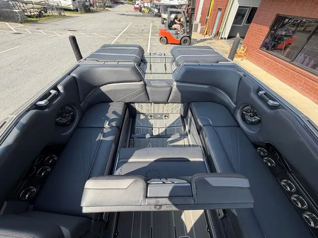 Slide: The Image of Interior of a 2023 Supra SL550 boat with luxurious seating. - 31
